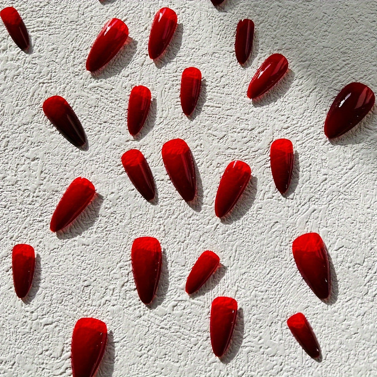 24-Piece Almond Shaped Medium Length Red Press-on Nails Set F607